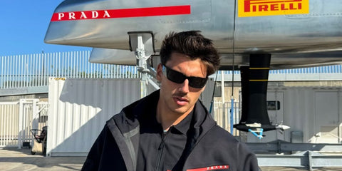 Italian entrepreneur and digital creator Luca Santeramo was seen wearing black Prada PR A14S 1AB5S0 wraparound sunglasses in his Instagram post, September 2024.