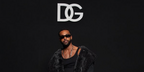 Lucien Laviscount is seen wearing Dolce&Gabbana DG4458 501/87 rectangle sunglasses to attend the brand's Fall/Winter 2024 menswear fashion show in Milan