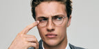 Lucky Blue Smith modeled Oliver Peoples Sidell OV1333 5036 optical glasses for the brand's Fall/Winter 2023 campaign