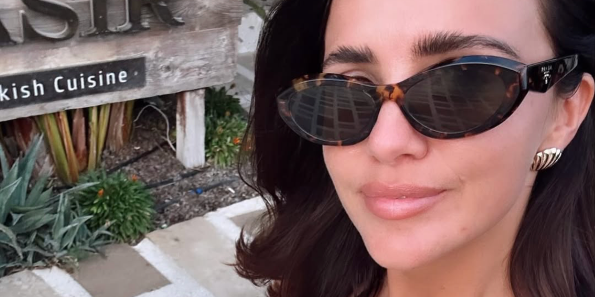 Lucy Mecklenburgh  was seen wearing tortoisehell Prada PR 26ZS 14L09Z cat eye sunglasses in her Instagram post, October 2025.