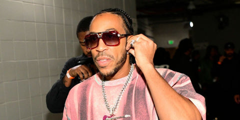Ludacris was seen wearing red Cazal Legends 664 004 sunglasses at the HeartRadio 96.1 The Beat's Jingle Ball 2025 in Atlanta, Georgia.