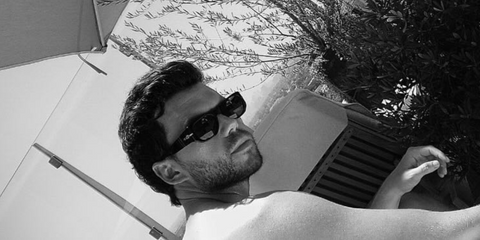 Bridgerton actor Luke Newton was seen wearing black Persol 3307S 95/31 sunglasses in his Instagram post, July 2024.