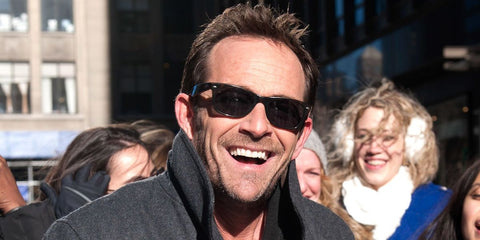 Beverly Hills, 90210 actor Luke Perry was seen wearing an earlier version of tortoiseshell Ray-Ban New Wayfarer RB 2132 902 sunglasses in New York City, January 2013