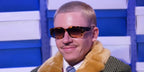 Macklemore was seen wearing bright tortoiseshell Tom Ford Silvano-02 TF989 53T sunglasses with brown gradient lenses at the Full Size Run show, March 2023