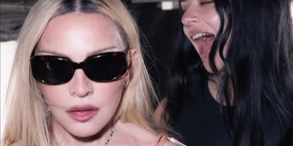Madonna was seen wearing tortoise Saint Laurent Sun SL 868 003 sunglasses at the Saint Laurent Menswear Spring/Summer 2027 fashion show during Paris Men's Fashion Week.