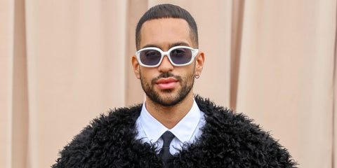 Mahmood is seen wearing white-framed Burberry Milton BE4338 3007/85 sunglasses