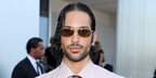 Italian singer-songwriter Mahmood wore gold Prada PR D59S 5AK70G sunglasses with green olive lenses at the Prada Menswear Spring/Summer 2027 fashion show during Milan Men's Fashjon Week.