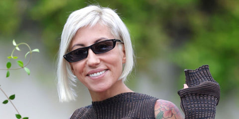 Italian singer Malika Ayane was seen wearing black Tom Ford Alejandro TF1058 01A thin rectangular sunglasses at the Venice Film Festival 2023