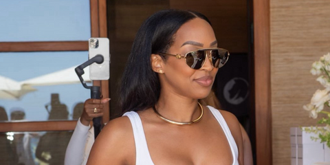 Malika Haqq was seen wearing gold and silver Loewe Metal LW40116U 30F sunglasses in her Instagram post