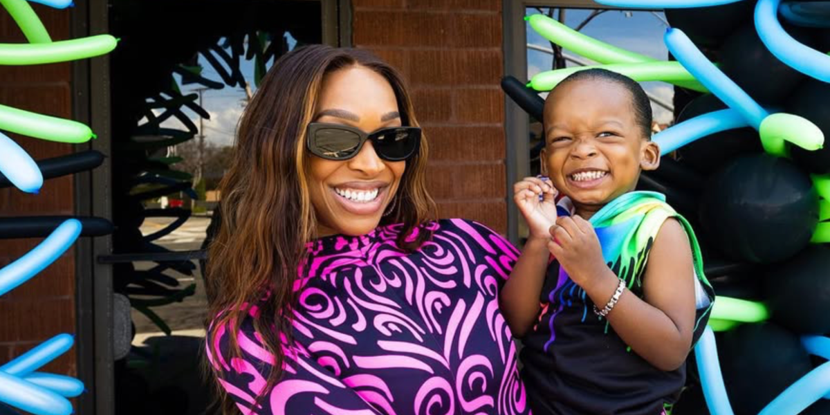 Malika Haqq was seen wearing black Prada PR 14YS 1AB5S0 rectangular sunglasses in her Instagram post