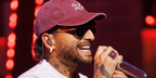 Maluma was seen wearing Loewe Slim LW40192U 30N aviator sunglasses with green lenses at the American Music Awards 2026 rehearsal.