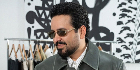 American radio host Mando Fresko was seen wearing gold Prada PR A60S 5AK70G rectangular sunglasses in his Instagram post, March 2026.