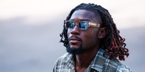 French footballer Manu Kone was seen wearing transparent yellow Saint Laurent Sun SL 572 003 sunglasses at the Centre National du Football, France, September 2025. Shop online now on Pretavoir