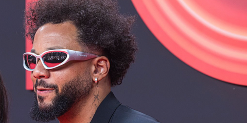 Brazilian former footballer Marcelo Vieira was seen wearing grey silver Balenciaga BB0157S 004 wraparound sunglasses at Netflix Spain's 10th Anniversary in Madrid, June 2025.