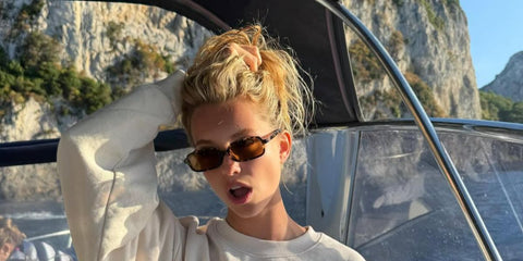 Portuguese actress Margarida Corceiro was seen wearing tortoiseshell Miu Miu Regard MU 11ZS VAU2Z1 rectangular sunglasses in her Instagram post, 20 May 2025. Shop online now on Pretavoir