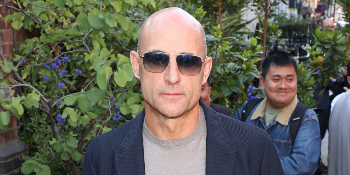 Actor Mark Strong was seen wearing silver Oliver Peoples Clifton OV1150S 5036/3F sunglasses with blue gradient Photochromic lenses in London, June 2022. Shop online now on Pretavoir