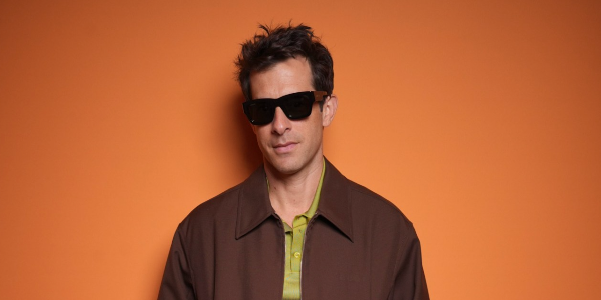 Mark Ronson wears Gucci GG1668S 001 sunglasses to the brand's Spring/Summer 2025 fashion show in Milan