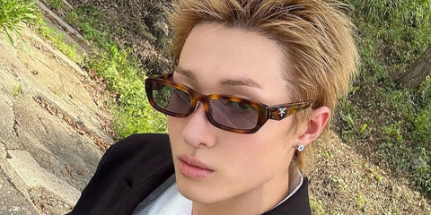 South Korean singer Martin of K-Pop group CORTIS was seen wearing tortoiseshell Prada PR B06S 15W03N sunglasses with purple lenses in his Instagram post, October 2025.