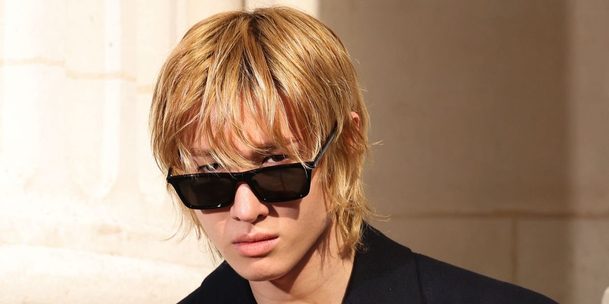 Martin Edwards of K-Pop group CORTIS was seen wearing black Saint Laurent Sun SL 890 Betty Thin 001 sunglasses at the Saint Laurent Menswear Spring/Summer 2027 fashion show during Paris Men's Fashion Week.