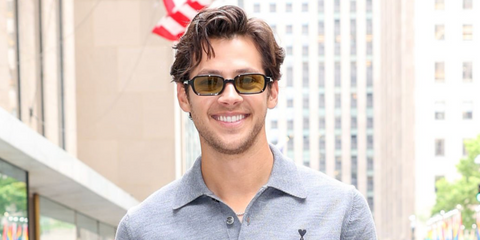 Actor and singer Matt Cornett was seen wearing black Miu Miu Regard MU 11ZS 16K07O rectangular sunglasses with olive lenses in New York City, June 2026.