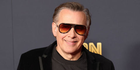 Executive producer Matthew Gross was seen wearing black and gold Dita Grand Decade DTS 460 01 30th Anniversary Limited Edition aviator sunglasses with grey to yellow gradient lenses at the Los Angeles premiere of "EPiC: Elvis Presley in Concert", February 2026