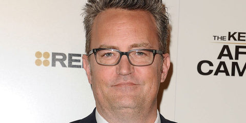 Matthew Perry is seen wearing Oliver Peoples Denison OV5102 1124 Matte Storm optical glasses