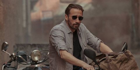 Matthias Schoenaerts is seen wearing Ray-Ban Caravan RB 3136 181 sunglasses in the 2020 movie "The Old Guard"