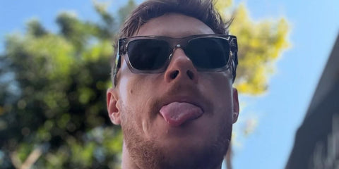 Actor Max Parker was seen wearing transparent grey Prada PR A06S 16Z70B sunglasses in his Instagram post, August 2025.