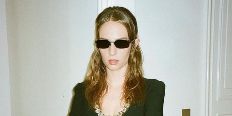 Maya Hawke was seen wearing Prada PR A60S 1AB5S0 sunglasses to attend the brand's Spring/Summer 2025 fashion show during Milan Fashion Week