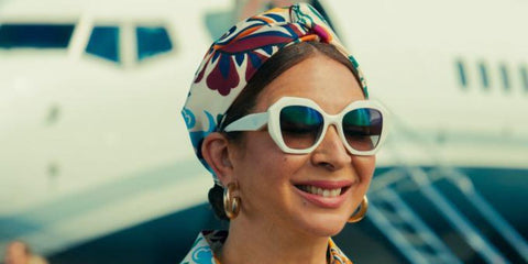 Maya Rudolph was seen wearing white talc Prada PR 16WS 142130 sunglasses with grey gradient lenses in AppleTV series LOOT