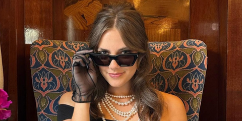 The Crown actress Meg Bellamy was seen wearing black Saint Laurent Sun SL 633 Calista 001 sunglasses in a feature by glovemaker Cornelia James