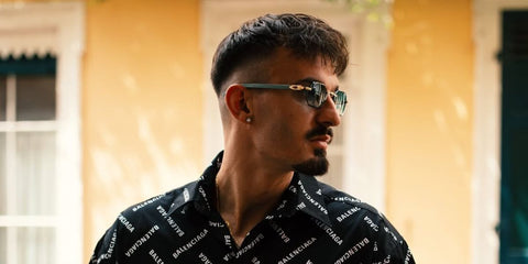 German footballer Mergim Berisha was seen wearing green Cartier CT0439S 004 rimless sunglasses in his Instagram post, June 2024.