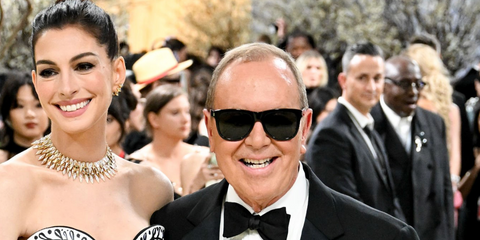 Fashion designer Michael Kors, who dresses Anne Hathaway for the Met Gala 2026 was seen wearing black Saint Laurent Sun SL 816 001 sunglasses.