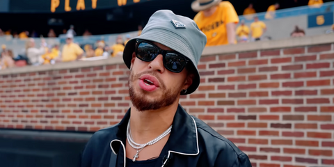 Basketball player Michael Porter Jr. was seen wearing ASAP Rocky Blacked Out Collection Ray-Ban Mega Wayfarer RB 0840S 6826/J5 sunglasses in his YouTube vlog, September 2025.
