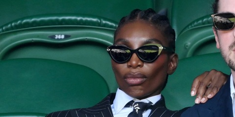 Michaela Coel was seen wearing black Ralph Lauren RL8236U 5001/87 cat eye sunglasses at the Wimbledon Tennis Championships 2026
