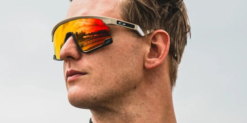 German racing driver Mick Schumacher was seen wearing beige and black Oakley BXTR OO9280 04 Prizm sunglasses in a social media post