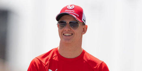 German racing driver Mick Schumacher was seen wearing silver Ray-Ban Aviator 3025 003/32 sunglasses with grey gradient lenses.