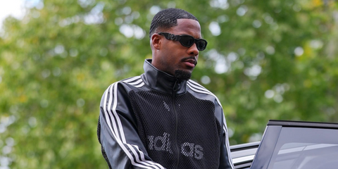 French footballer/goalkeeper Mike Maignan was seen wearing all-black Versace 4361 5360/87 Medusa Biggie sunglasses at the French National Team Training & Press Conference in October 2025. Shop online now on Pretavoir