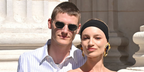 Model Mikkel Jensen, pictured alongside girlfriend Maya Stepper, was seen wearing silver Saint Laurent SL 799 002 round oval sunglasses at the Saint Laurent Menswear Spring/Summer 2026 fashion show during Milan Men's Fashion Week.