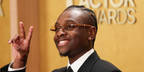 Miles Caton was seen wearing gold and brown wood Cartier Premiere CT0377O 002 optical glasses at The 32nd Actor Awards (formerly Screen Actor Guilds Awards), March 2026.