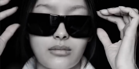 Thai actress Milk Pansa Vosbein was seen wearing black Saint Laurent SL 757 001 sunglasses in her Instagram reel, ahead of the Saint Laurent Fall/Winter 2026 fashion show during Paris Fashion Week.