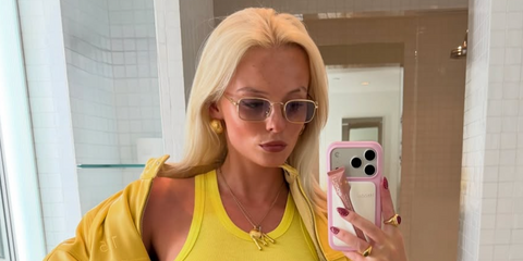Celebrity actress Millie Gibson was seen wearing gold Miu Miu MU A53S 5AK04O square sunglasses with grey gradient lenses in her Instagram post, February 2026.