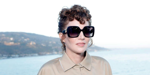 Writer and filmmaker Miranda July was seen wearing black Miu Miu MU 10YS 1AB5D1 butterfly sunglasses with grey gradient lenses at the Miu Miu Summer Ckub Malibu, July 2023. Shop online now on Pretavoir