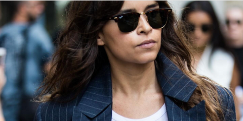 Russian entrepreneur and fashionista Miroslava Duma was seen wearing tortoiseshell Ray-Ban Clubmaster Classic 3016 W0366 half-rim sunglasses in New York City