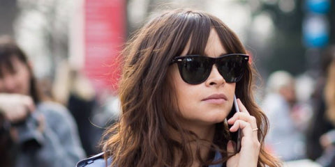 Russian entrepreneur and fashionista Miroslava Duma was seen wearing black Ray-Ban Wayfarer II RB 2185 901/31 sunglasses. Shop online now on Pretavoir