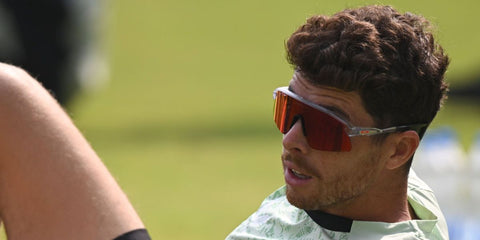 New Zealand cricketer Mitchell Santner was seen wearing transparent Oakley Stunt Devil OO9517 10 Prizm sunglasses ahead of the ICC Men's T20 World Cup India & Sri Lanka 2026, facing Afghanistan.