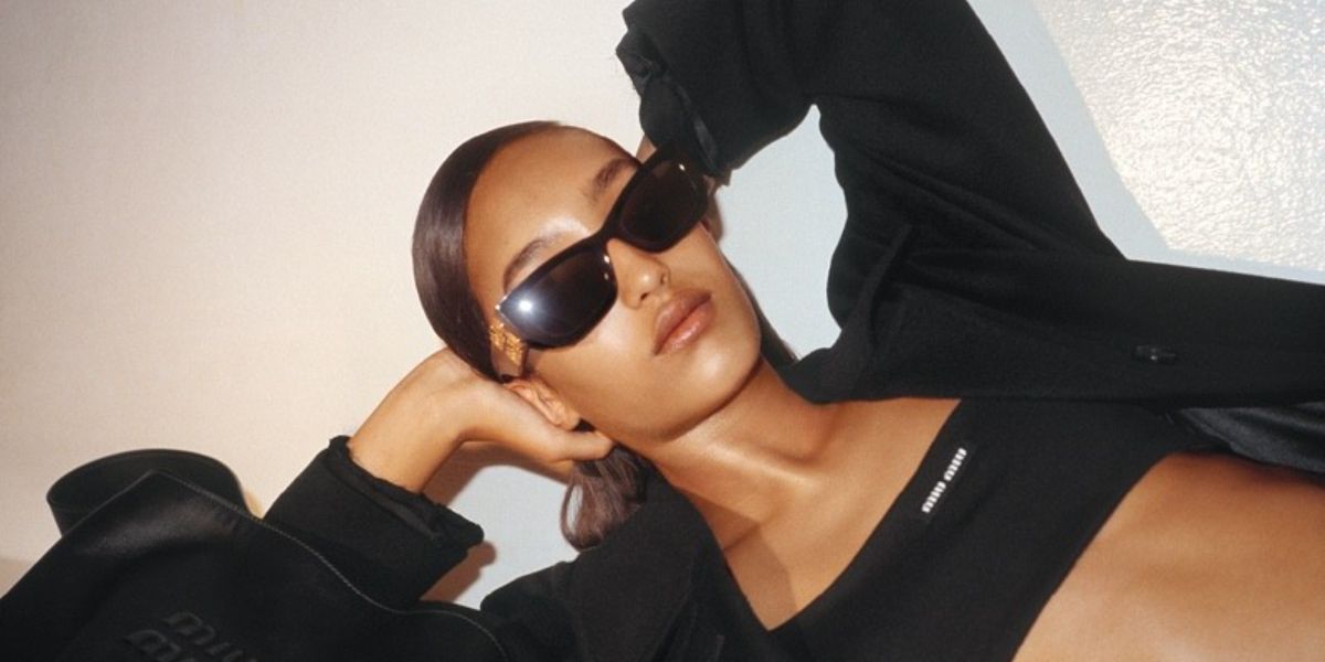 Mona Tougaard was seen modeling black Miu Miu MU 09WS 1AB5S0 sunglasses in the Miu Miu Holiday 2023 campaign