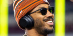 American football player Myles Garrett of the Cleveland Browns was seen wearing matte black Ray-Ban RB 3716 186/R5 sunglasses at the NFL Draft 2017.