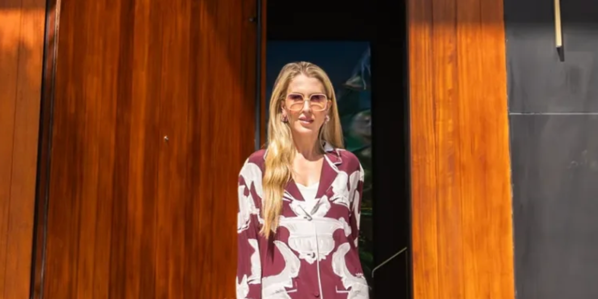 Artist and philanthropist Natalia Kapchuk was seen wearing ivory white Valentino Vilouette VG0025S 004 oversized sunglasses with red gradient lenses in a Harper's Bazaar Arabia feature, April 2026.