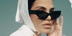 Natti Natasha was seen wearing black Dolce&Gabbana DG4450 501/87 cat eye sunglasses